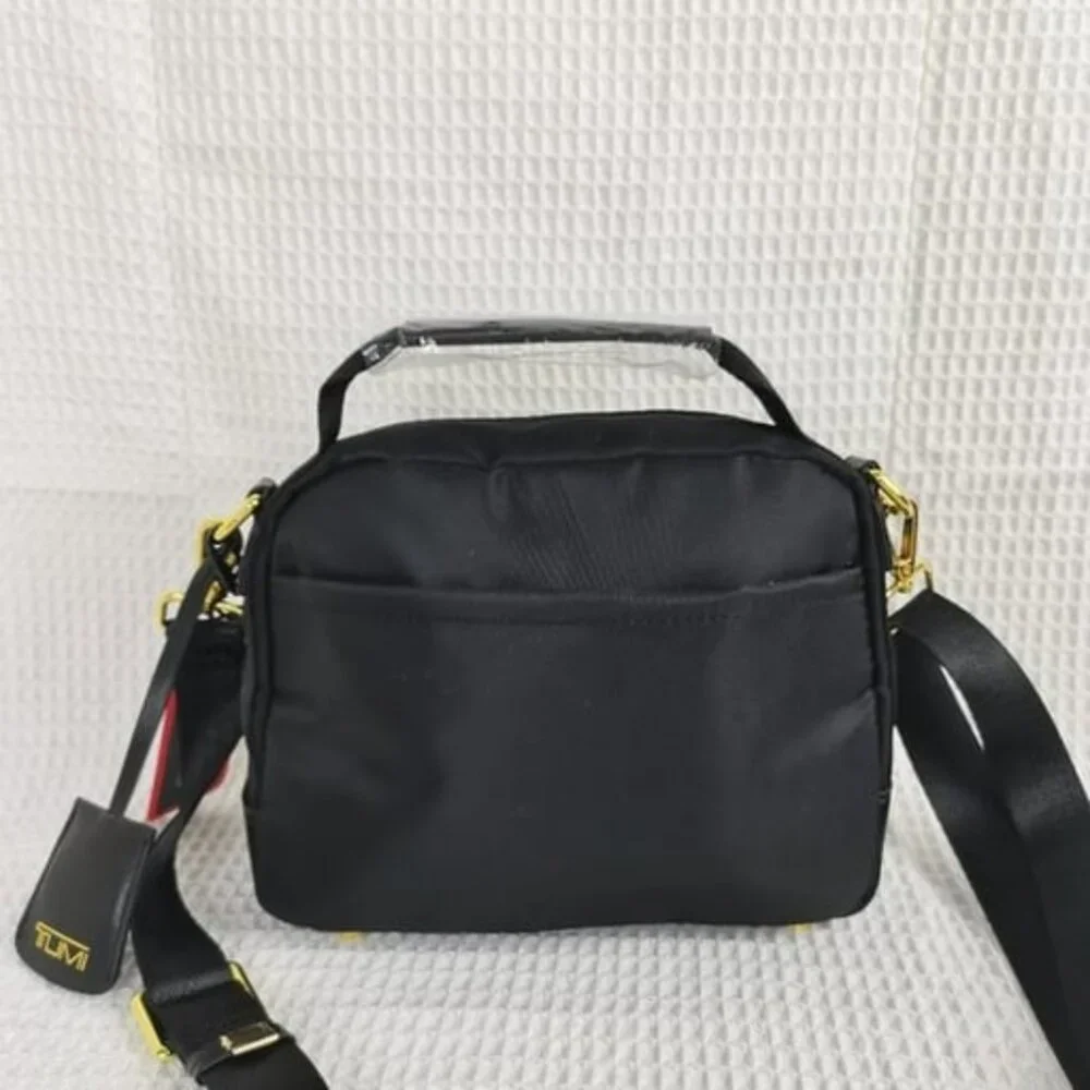 Tumi Voyageur Troy Zip Pocket Crossbody Bag in Black/Gold